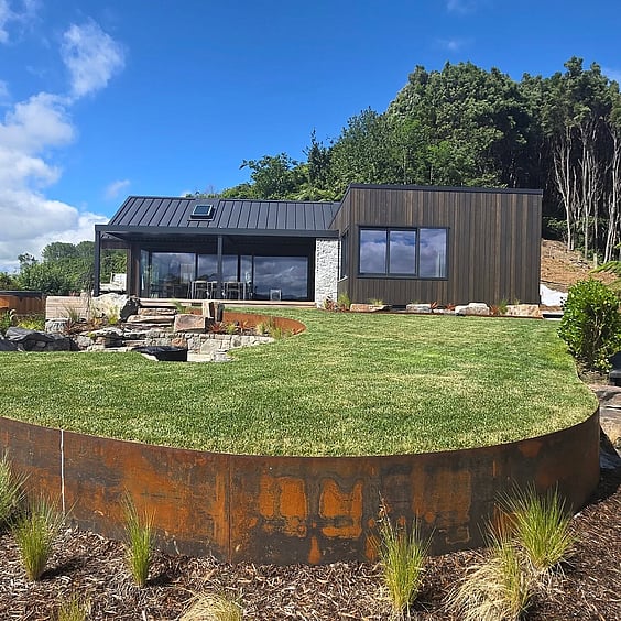 large boulders used in a garden in a Rotorua home
