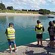 Kids fishing off the wharf