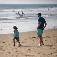 Counselling - father with child on the beach