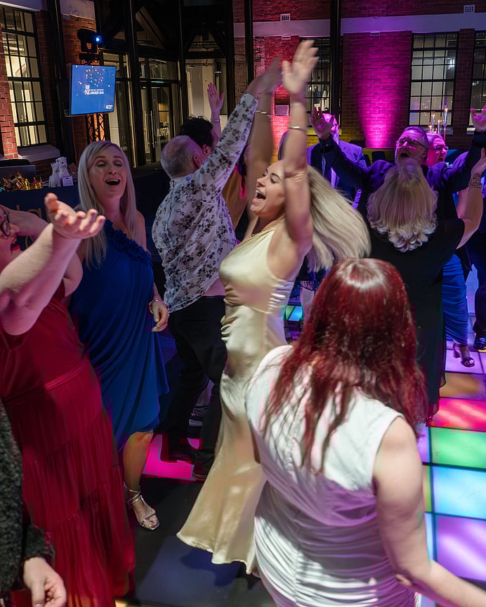 Brand portrait of Karin Vincent from Tea & Happiness Rotorua in front of her tiny home