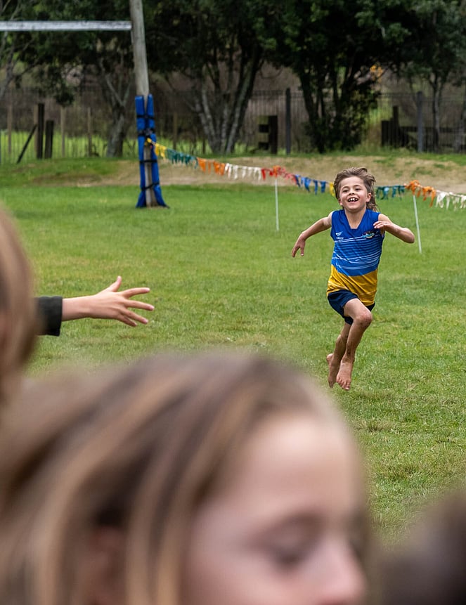 Moody New Zealand landscape photo of Lake Wakitipu shoreline in autumn