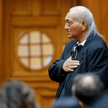 Image of two Ngāti Ruapani members hugging at AIP