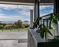 indoor outdoor entertaining pool house