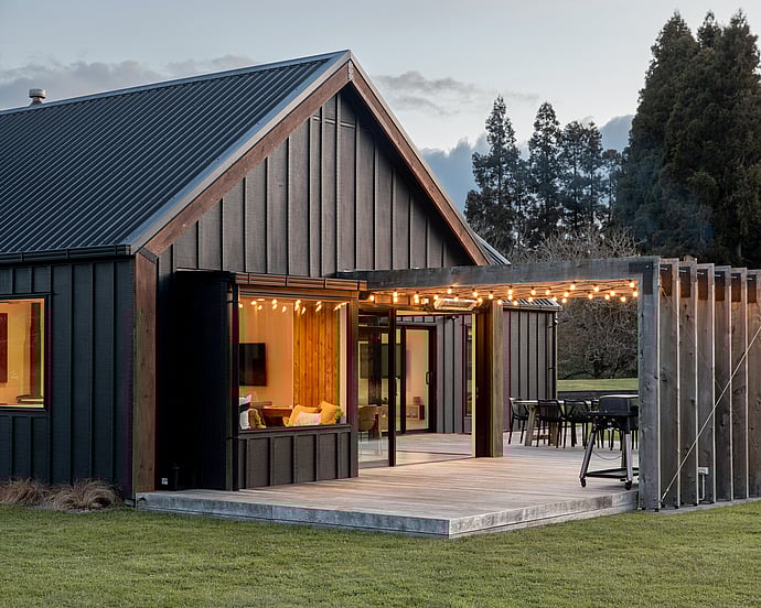 black board and batten gable end home