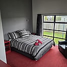 Spacious bedroom of 14 Cologne Street with view into backyard