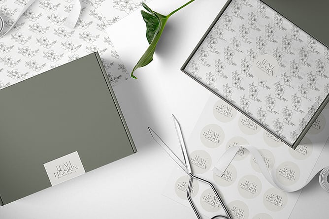 Image of Leah Hoskin Photography's branding on packaging. Image for blog post "Why do I need different variations of my logo". Creative Box. New Zealand.