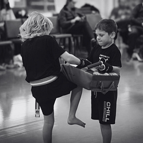 Kickboxing fitness class with guard up