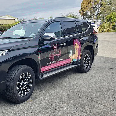 Custom suv graphics with company logo and contact details