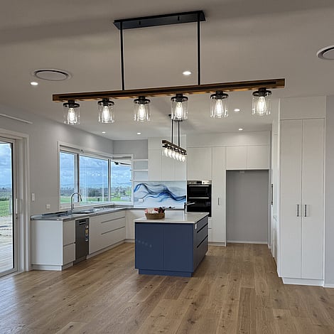 Image of elegant country home kitchen in white and navy. Te Wharepu Road new home build. Built by Ardent Building Developments, Hamilton. Waikato, New Zealand.