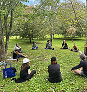 Listening and sharing with our forest therapy guide Tahia Devisscher from Canada