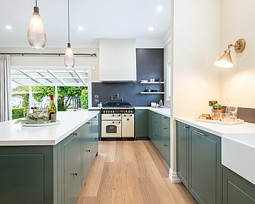 Image of newly renovated heritage kitchen in deep sage & white. Renovated by local Te Awamutu residential builders, Whitechurch Construction.
