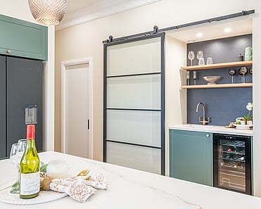 Image of newly renovated heritage kitchen in deep sage & white. Renovated by local Te Awamutu residential builders, Whitechurch Construction.