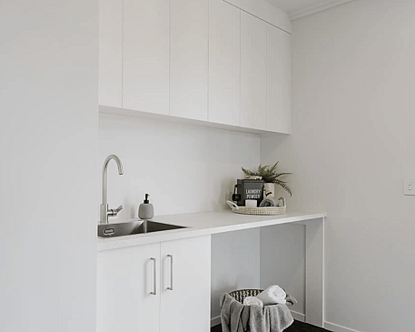 Image of modern white laundry room in Collinson Street, Pirongia new home, by Waikato residential builders Whitechurch Construction Limited.