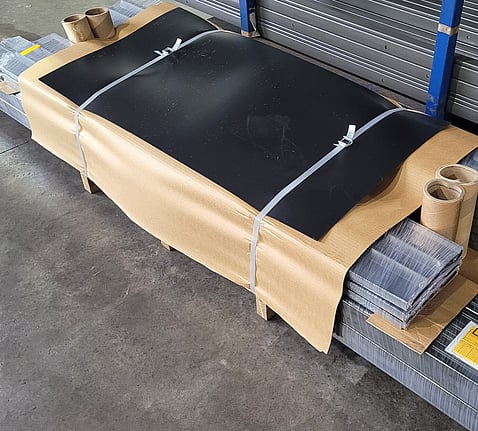 photo of a flat pack on a pallet, ready for delivery