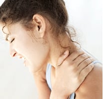 Woman expressing neck pain