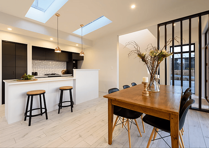Skylights and vaulted entry for space and light