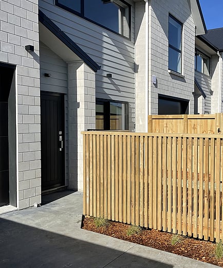Image of timber fencing surroundings built to complement new apartments in Hamilton. Built by Ardent Maintain, a division of Ardent Building Developments. Hamilton, Waikato, New Zealand.