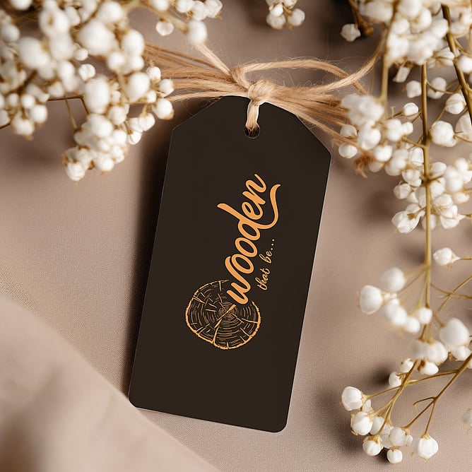 A logo on a tag illustrating a wedding business brand collateral
