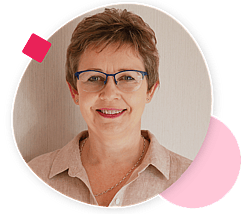 Portrait of a woman with short brown hair and glasses, wearing a beige shirt, smiling, framed by a pink circle with geometric accents