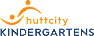 Hutt City Kindergartens logo with 'huttcity' in orange and 'KINDERGARTENS' in navy, featuring two abstract orange figures forming a wave shape