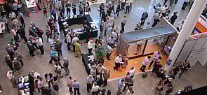 Sponsors viewing exhibits at a trade show