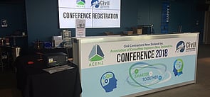 Conference attendee registering for entry