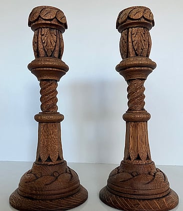 Pair of antique hand-carved gothic revival English oak candlesticks