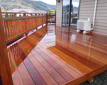 Polished timber deck with matching fence and rural views in Tasman