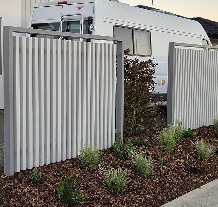 Modern vertical slat fence installed by Sherlock Landscaping in Nelson &mdash; contemporary outdoor boundary design with clean lines and durable construction