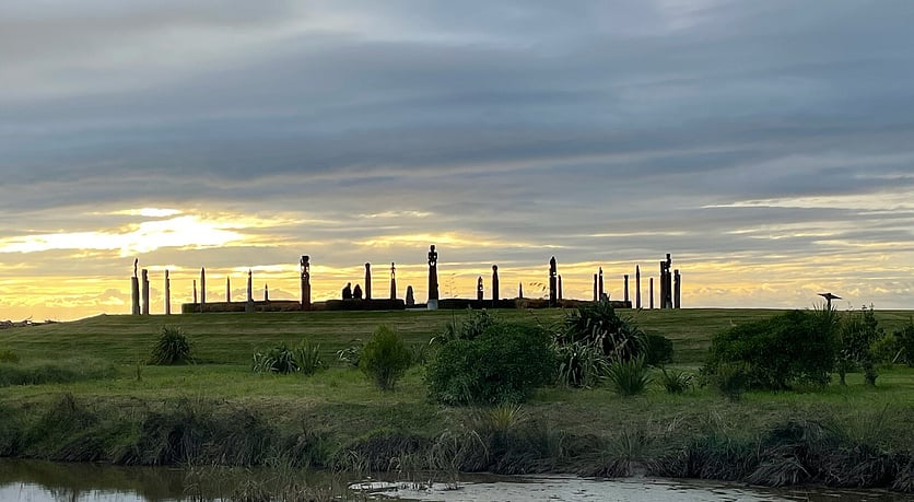 Waitangi Development Napier in the sunset with water in the foreground