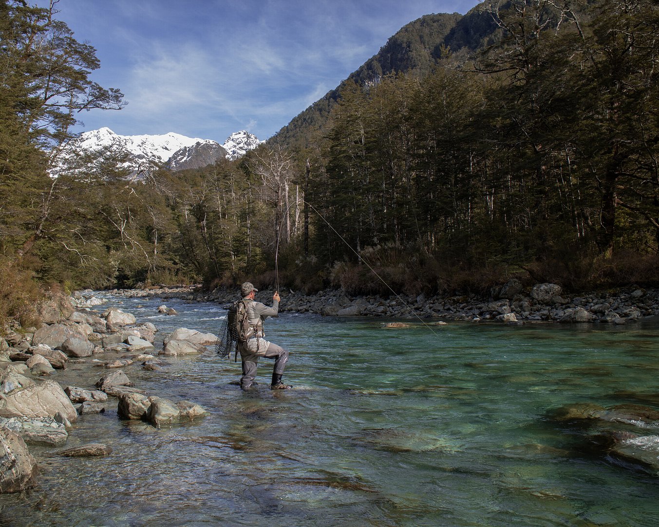 Hooked on a trophy brown trout New Zealand back country  Todd Adolph