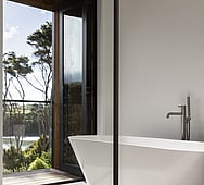 designer bathroom with Raglan estuary view &ndash; Nixon Homes