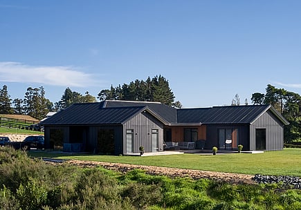 Luxury country home rural Waikato – open‑plan home and landscaped surroundings