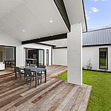 Spacious deck opening from living room &mdash; seamless indoor-outdoor flow, Nixon Homes