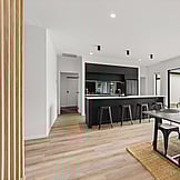 Indoor lounge flowing to kitchen and dining area &mdash; relaxed everyday living, Waikato home