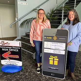  A giant cheque being presented to Centre Stage Theatre