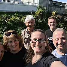Selfie of a group of Rotarians after a weeding event