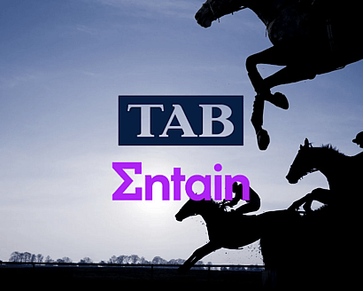 Horse racing scene with Entain TAB branding supported by Advanced Safety on ISO 45001 health and safety journey.