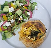 Our savoury quiche. Side salad dressed with a balsamic vinaigrette.  