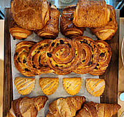 French pastries, cooked to perfection. croissants, pain au raisins, apple turnovers and pain au chocolate. 