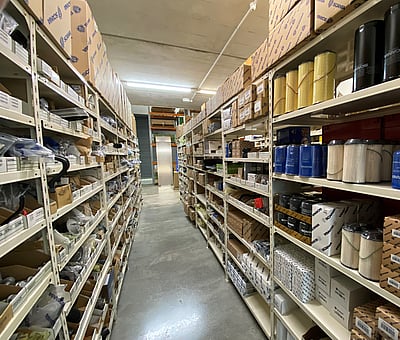 heavy truck parts on a shelf in the storeroom