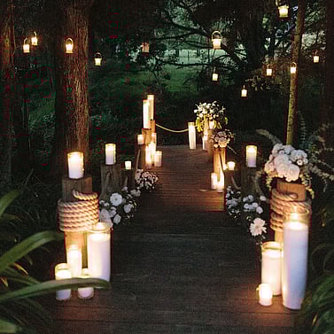 Winter wedding inspiration photo from Kumeu Valley Estate fireplace with flowers and curtain lights