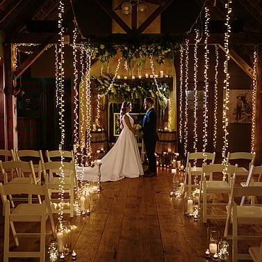 Winter wedding inspiration photo from Kumeu Valley Estate with Bride and Groom from a distance