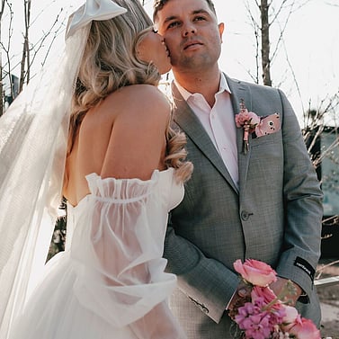 Winter wedding inspiration photo from Kumeu Valley Estate with Bride and Groom from a distance