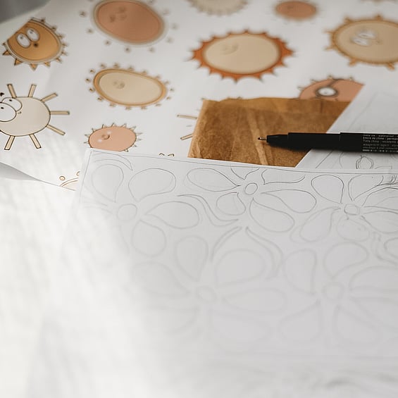 Image of sun and flower drawings by Kelly at Creative Box