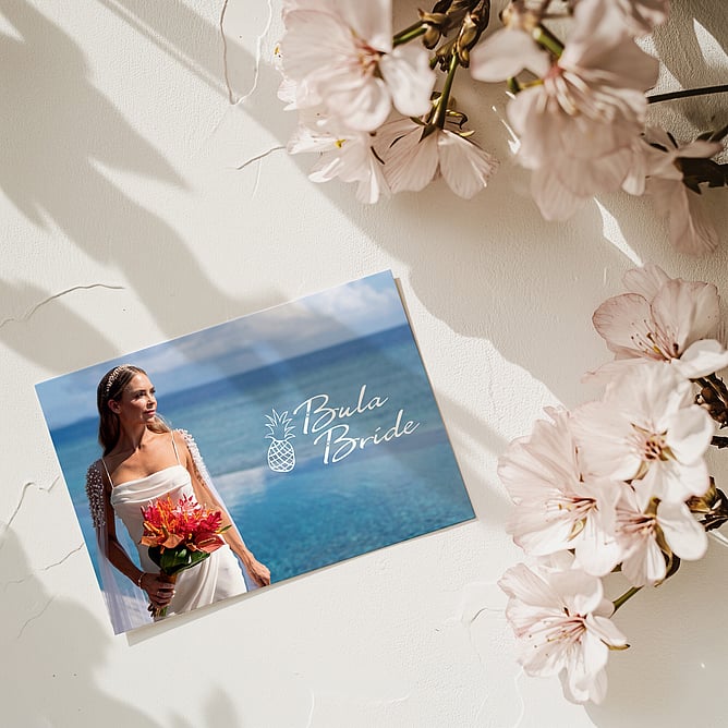 Wedding business card design displayed with floral styling representing aligned brand collateral for wedding professionals