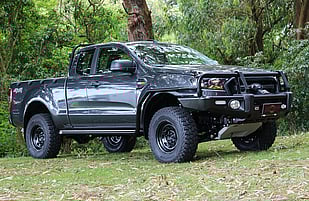 2018 Ford Ranger SuperCab Featuring an ARB Summit Bar, ARB Side Rails & Steps, Warn Winch, OME Front Suspension Lift, ARB Under Vehicle Protection Plate, Black Steel Wheels and Mickey Thompson ATZ P3's