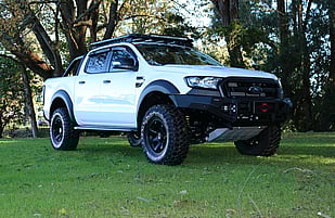 2018 Ford Ranger PXII Featuring a Drivetech4x4 Rival Aluminium Bull Bar with LED Fog Lights, Drivetech4x4 Under Armour Protection, ARB Summit Steps, Drivetech4x4 30" Lightbar, OME Suspension Lift, RhinoRack Pioneer Backbone & Tradie Tray, Lenso Wheels and Mickey Thompson MTZ P3 Tyres