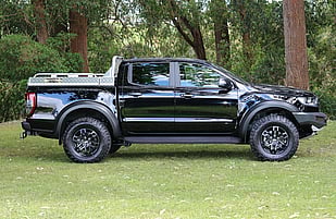 2019 Ford Ranger Raptor featuring a Rhino Evolution Bullbar fitted with Lightbar and Runva Premium Winch with Custom Built Dogbox & Storage (Foster Engineering)