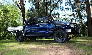 2016 Nissan NP300 Featuring an ARB Commercial Bull Bar with Fog Lights and Drivetech4x4 LED 9'' Combo Spot Lights, ARB Summit Side Rails & Steps, ARB Under Vehicle Protection Plates with Drivetech4x4 Recovery Points, Old Man Emu Suspension Lift, Safari Snorkel, Mickey Thompson Deegan 38 Tyres & Dynamic Steel Wheels